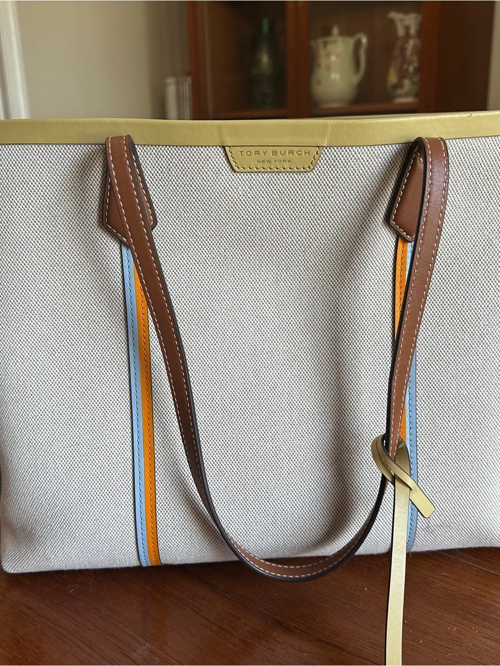 Tory Burch Canvas Tote with Brown Leather Trim and Orange & Blue Accents